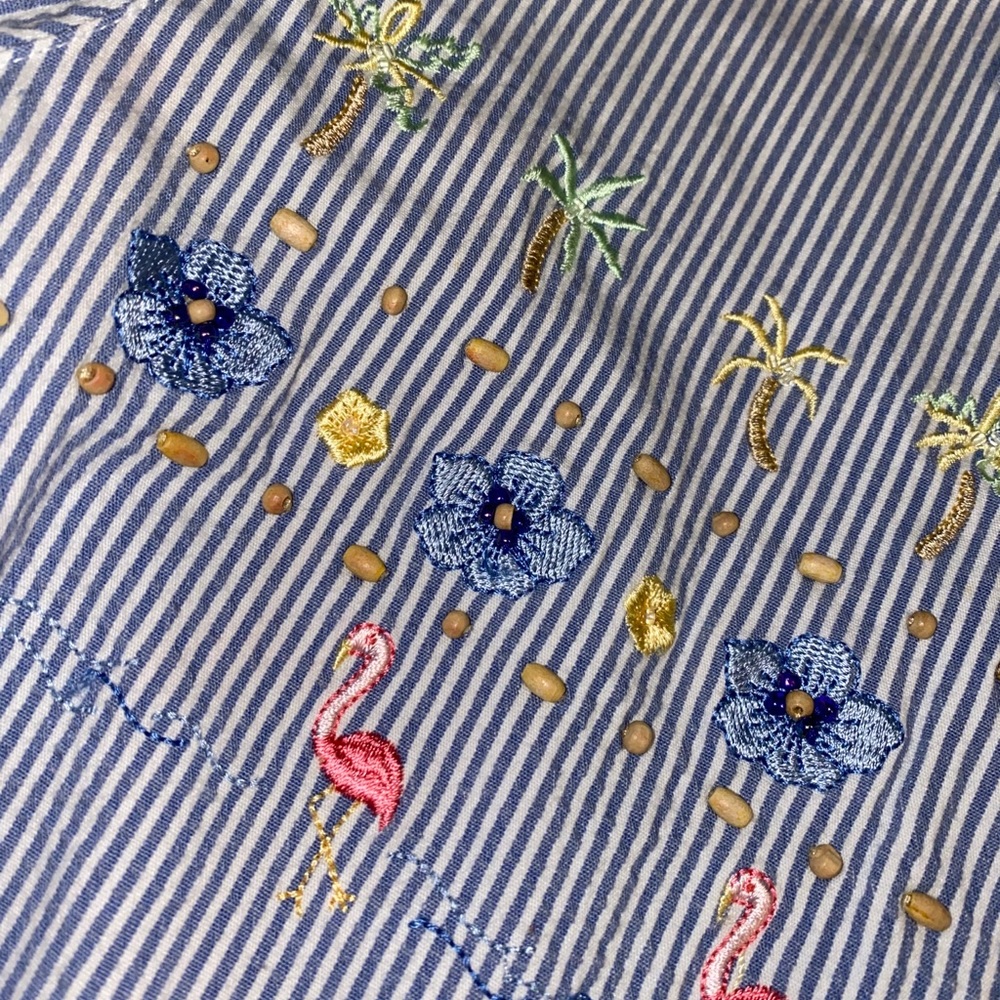 Adorable beaded button up top:)